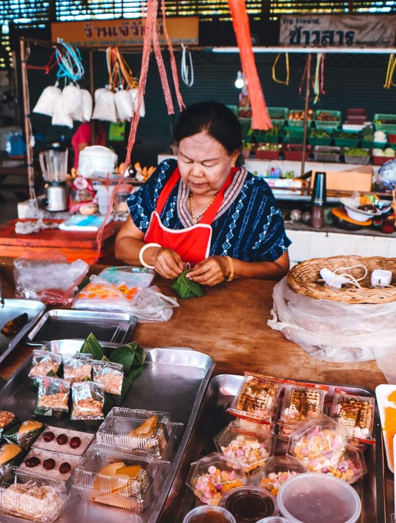 female vendor at local market stall