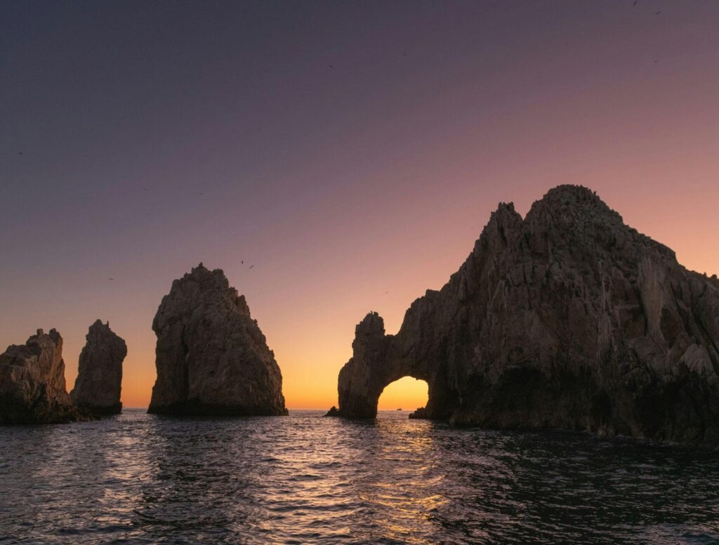 Sunset with rock formations on the beach