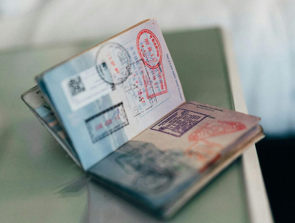 passport open showing multiple stamps