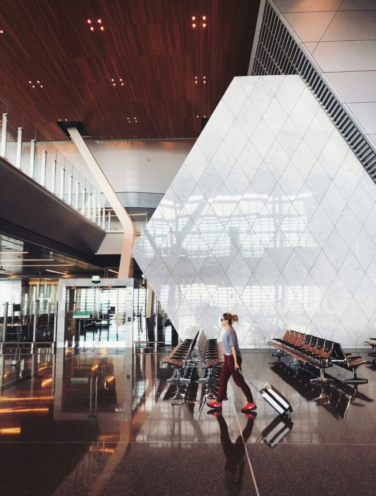 Woman  walking through an airport