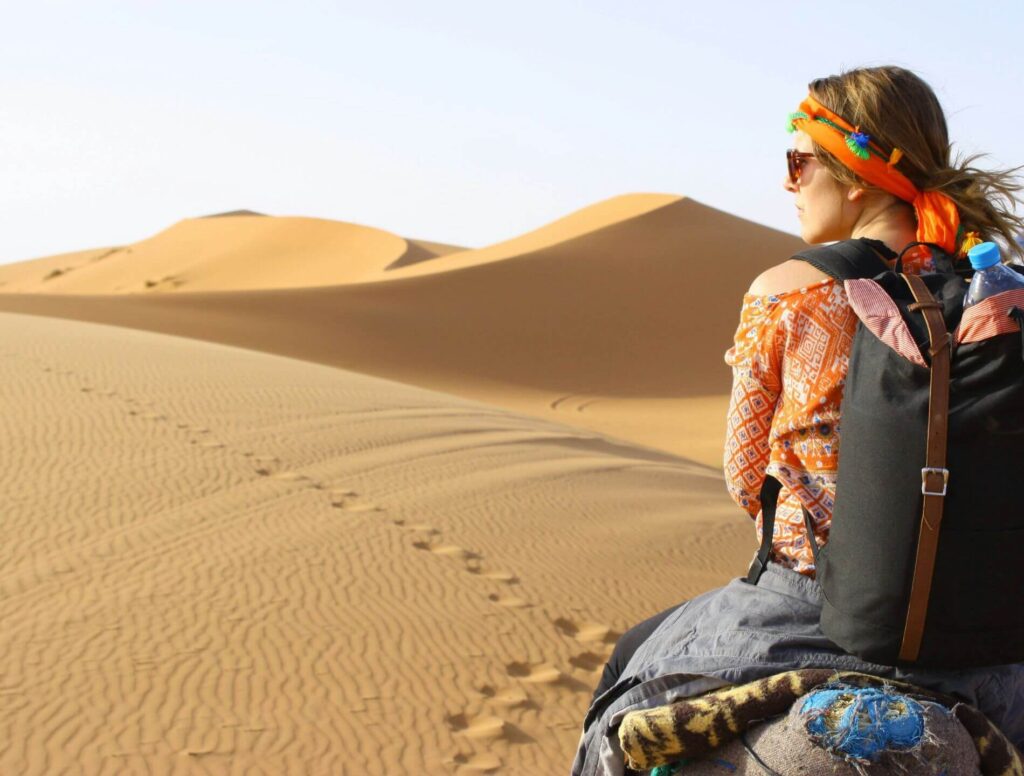 Woman looking out into a desert