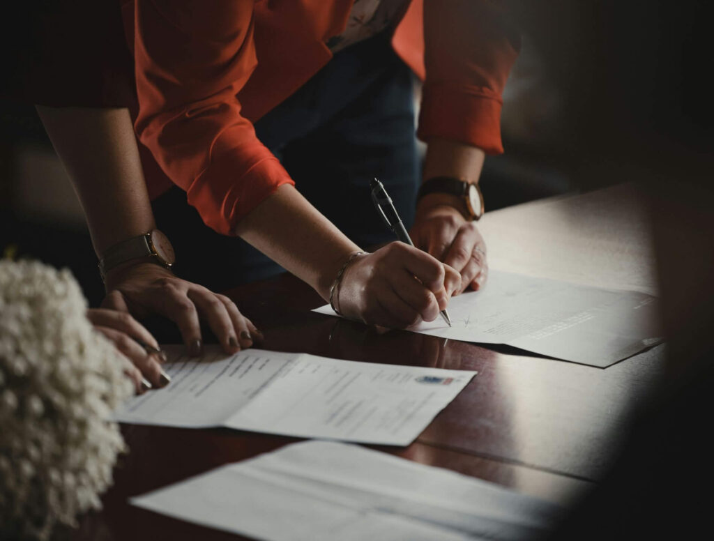 Women filling out paperwork