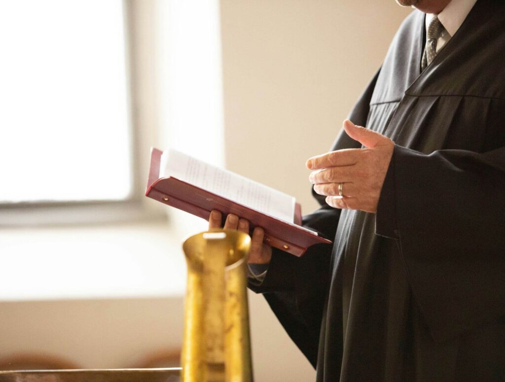 a judge holding a book